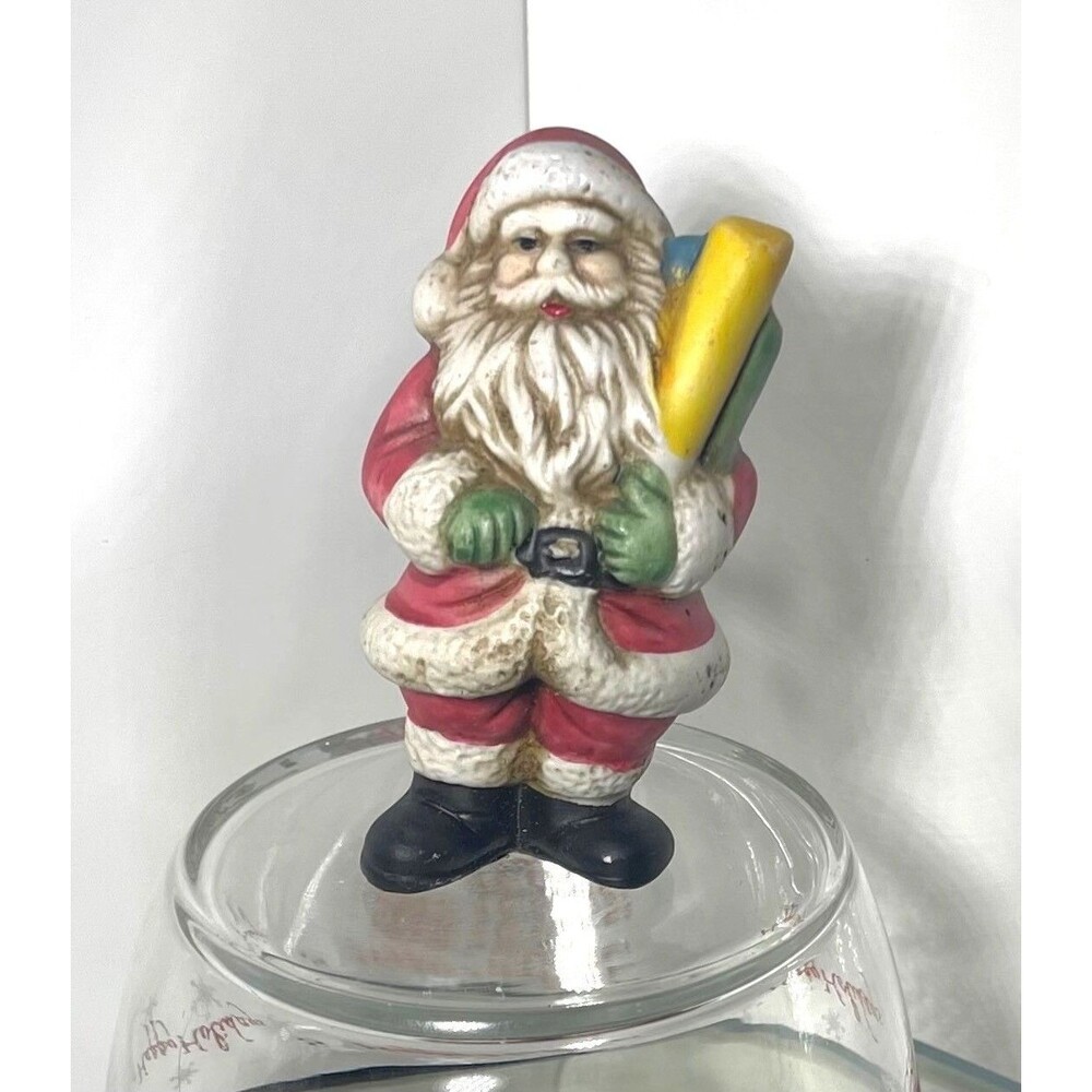 Vintage Tiny Santa Claus Figurine Holding Gifts